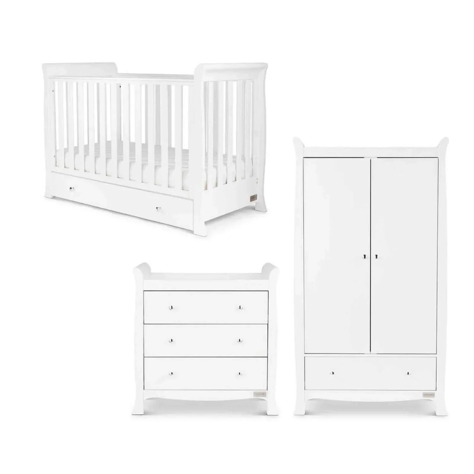 White mini cot bed, wardrobe, and two-drawer chest from a nursery furniture set