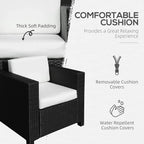 Black rattan armchair with thick white cushion and covered seat, armrests