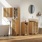 Freestanding natural wood bathroom cabinet with louvered doors, styling in a home bathroom
