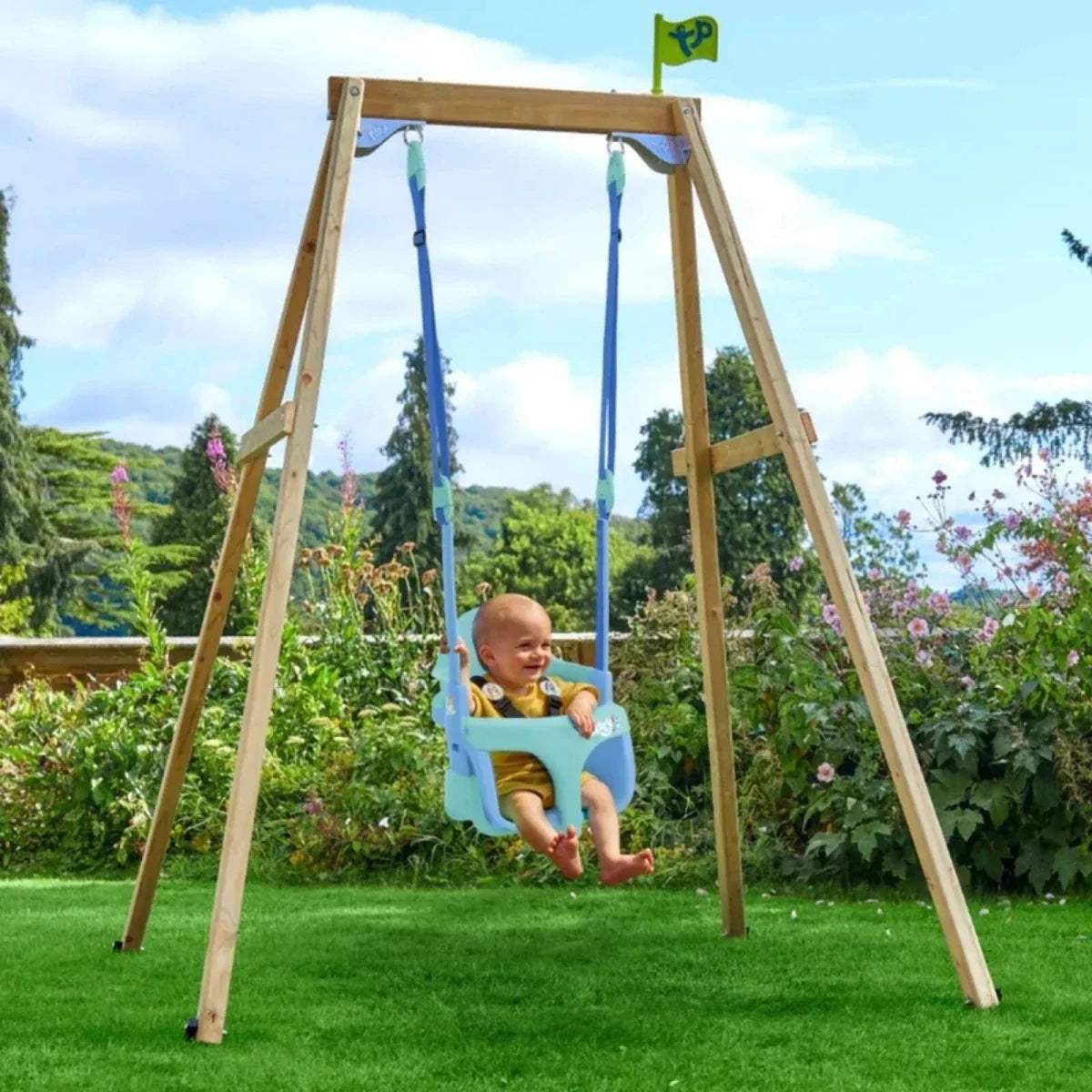 Wooden swing frame with blue ropes and turquoise seat holding a child