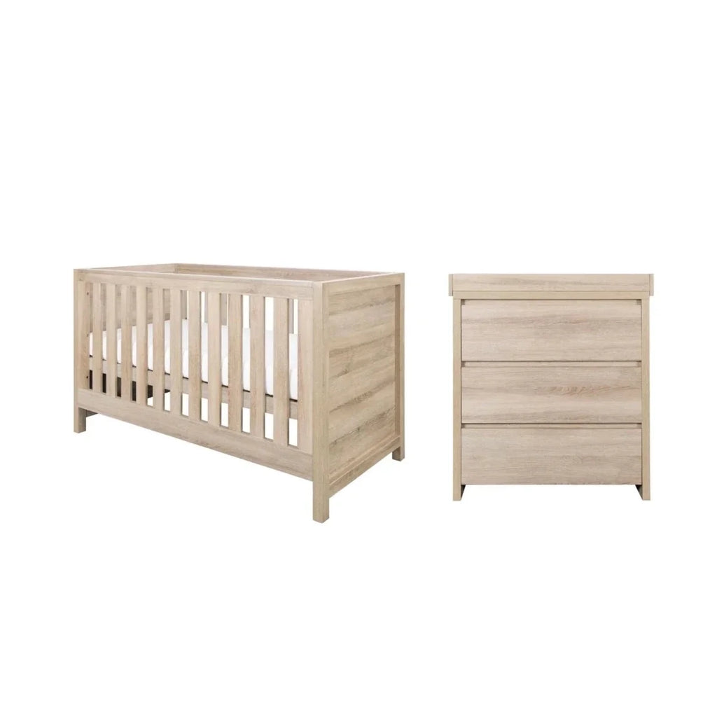 Light oak cot bed and 3-drawer dresser, side view