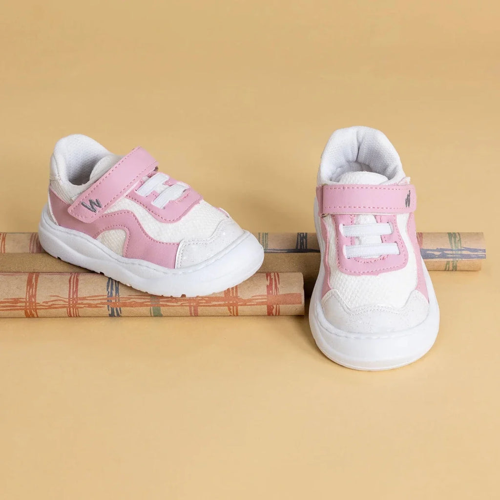 Girls first-step sneakers, pink-and-white, side view with hook-and-loop strap