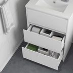 Bathroom vanity unit with two open pull-out drawers showing storage compartments