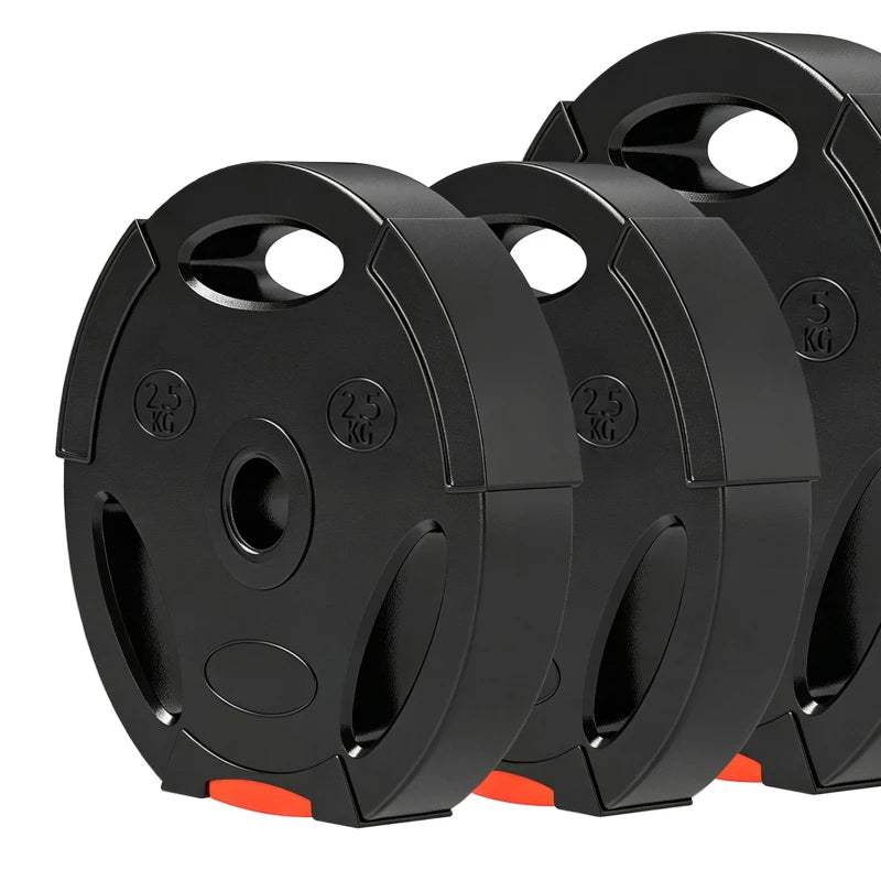 Five-disc view of black weight plates with 2.5kg markings and orange accents