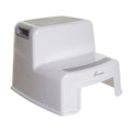 White two-step step stool with textured top platform and handle cutout