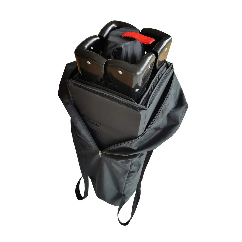 Black travel cot with attached organizer pocket and black carry handles