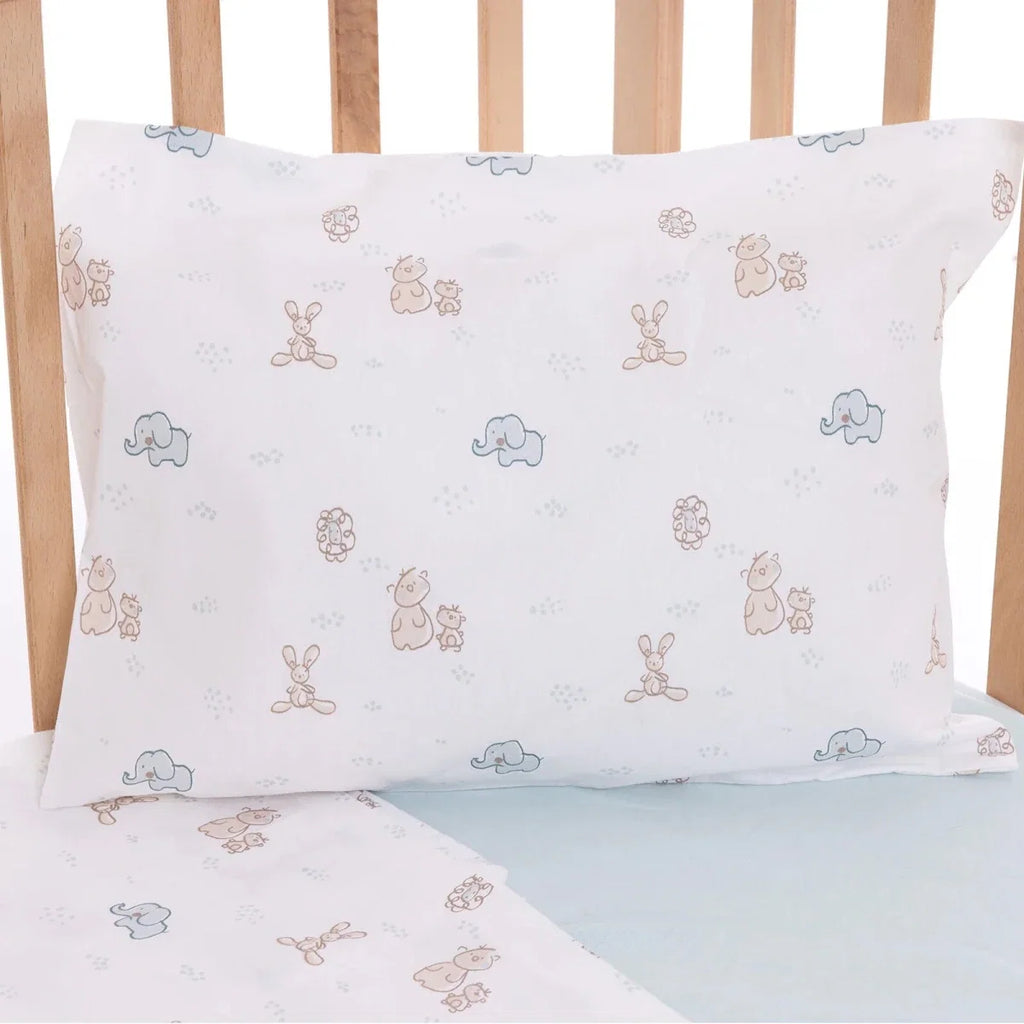 Animal printed pillowcase with light blue and beige motifs on white fabric