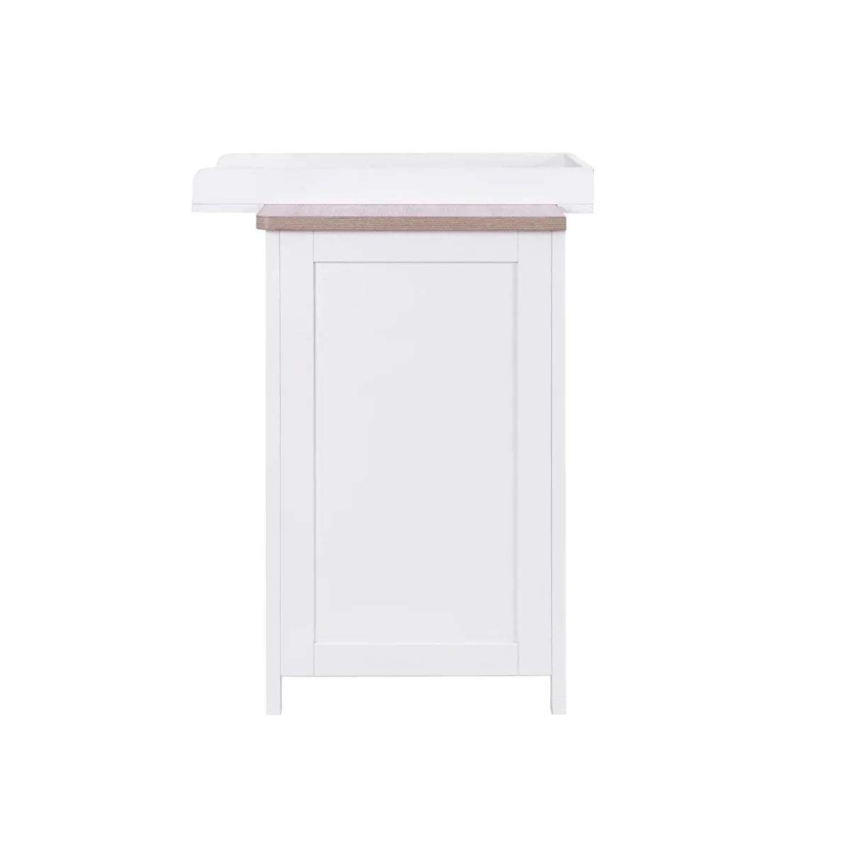 White changing dresser side view with oak-toned top rail and front cabinet panel