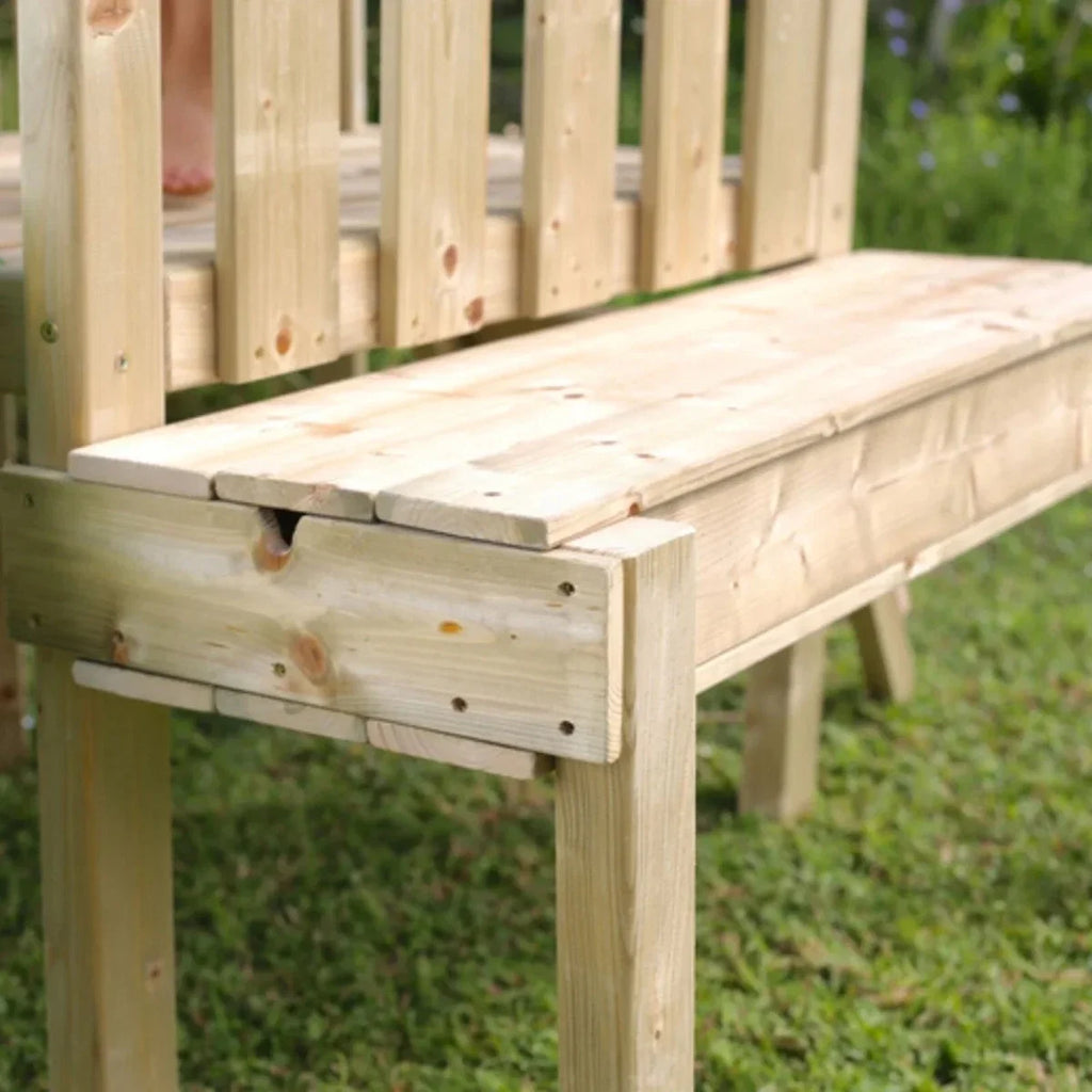 Wooden playset platform with slatted railings and light natural finish