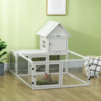 Light grey indoor rabbit hutch with elevated house, ramp, and fenced play area