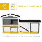 White 2-tier hutch with ramp section and wire-mesh doors, open run area