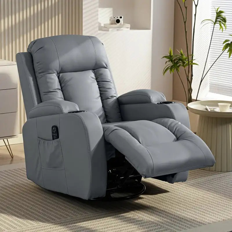 Grey massage recliner chair with curved headrest and extended footrest
