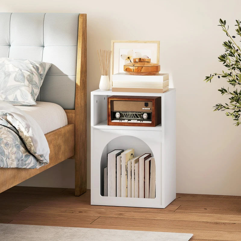 White bedside table corner view with open shelf and arched front storage compartment