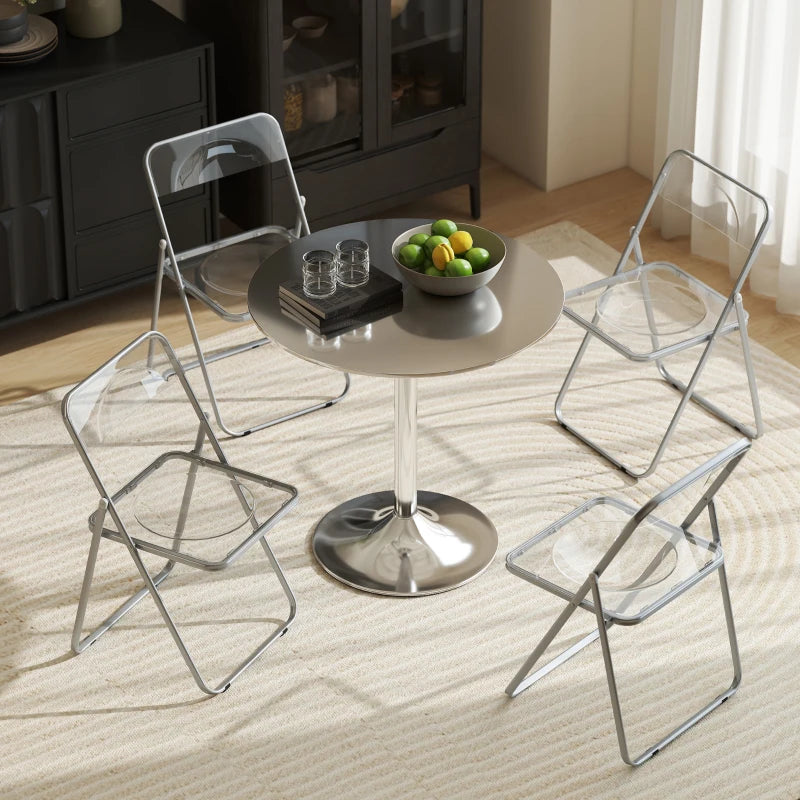 Clear folding chairs with transparent seats and backs around a small round table