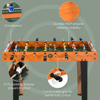 Foosball table with natural wood top, player rods, and green playing surface