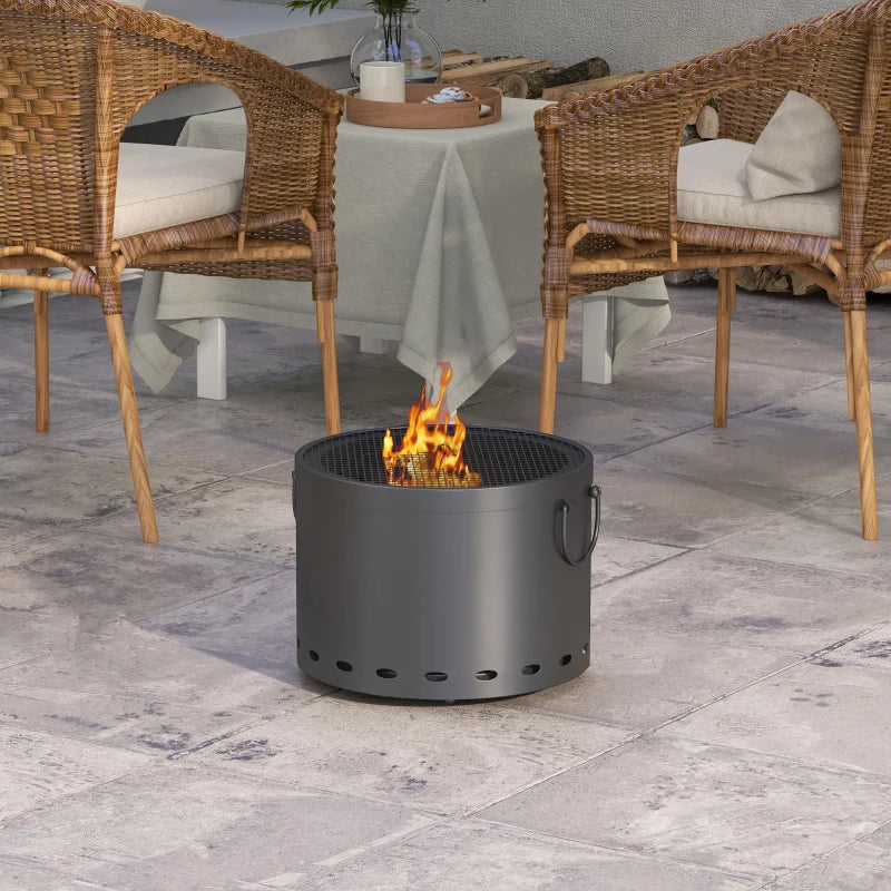 Dark grey round fire pit with carrying handles and visible flames
