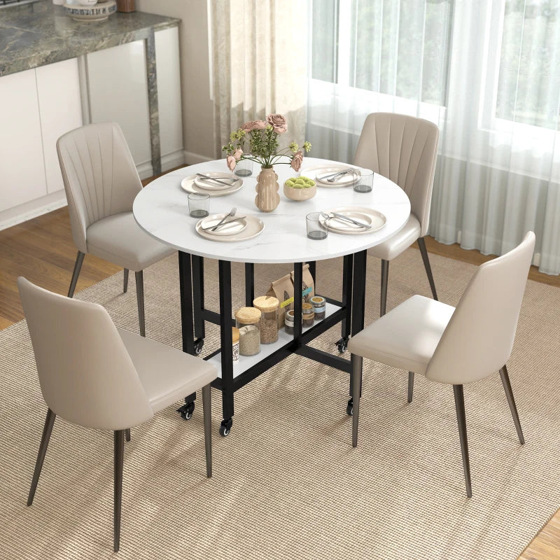 Round white marble folding dining table with open shelf and black legs, set for meals