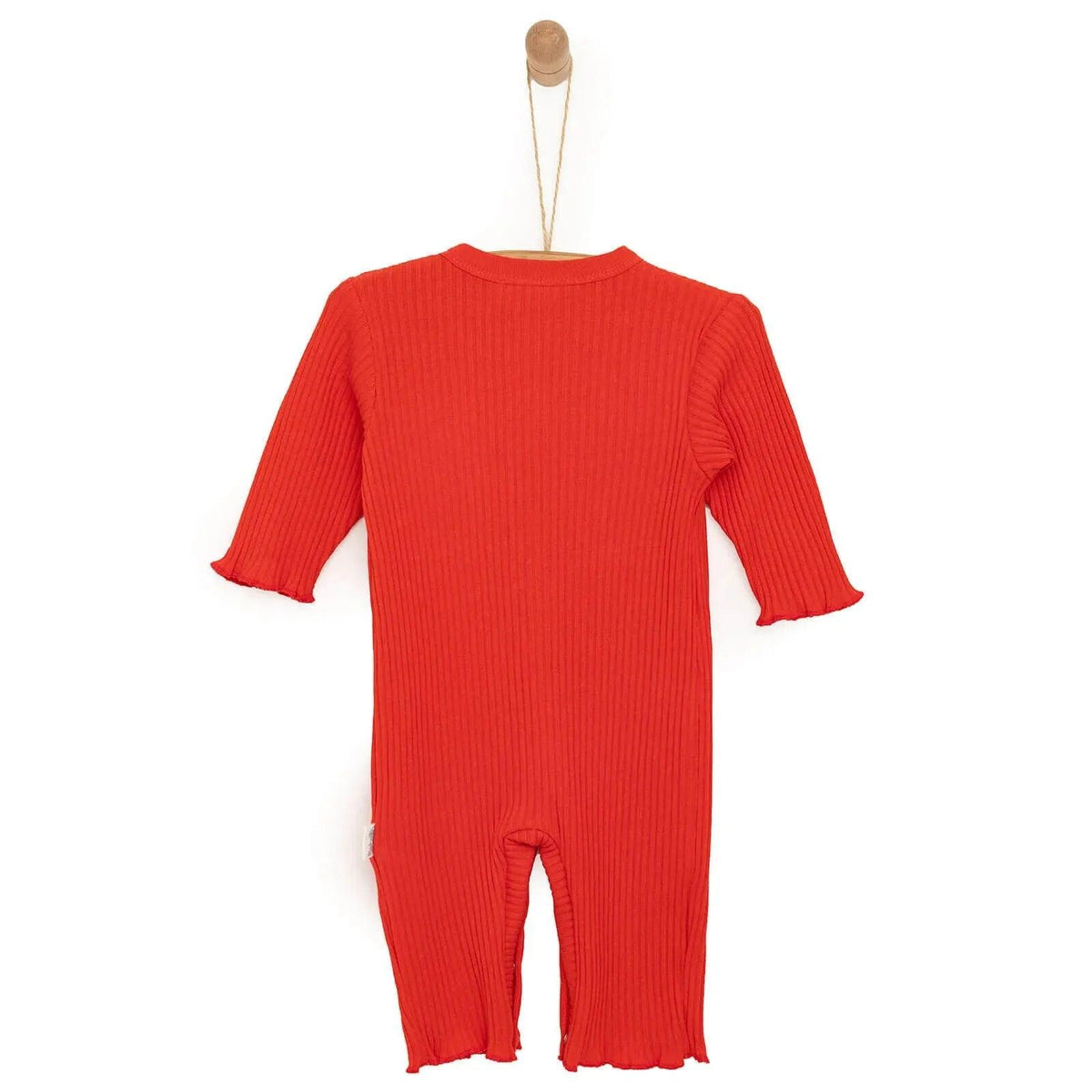 Newborn orange rib-knit jumpsuit, back view with snap crotch