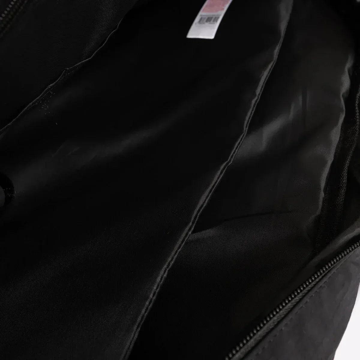 Black quilted shoulder bag interior lining with zipper opening