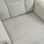 Light grey recliner seat cushion with smooth upholstered arms and stitching.