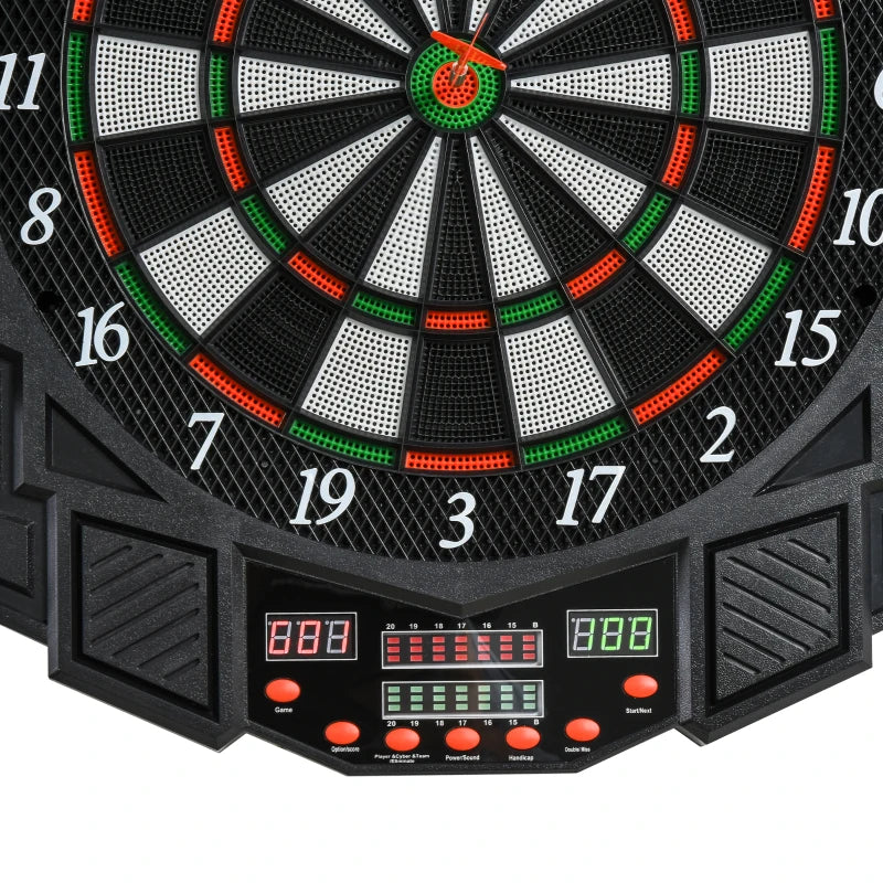Black electronic dartboard close-up with glowing target center and LED scoring screen