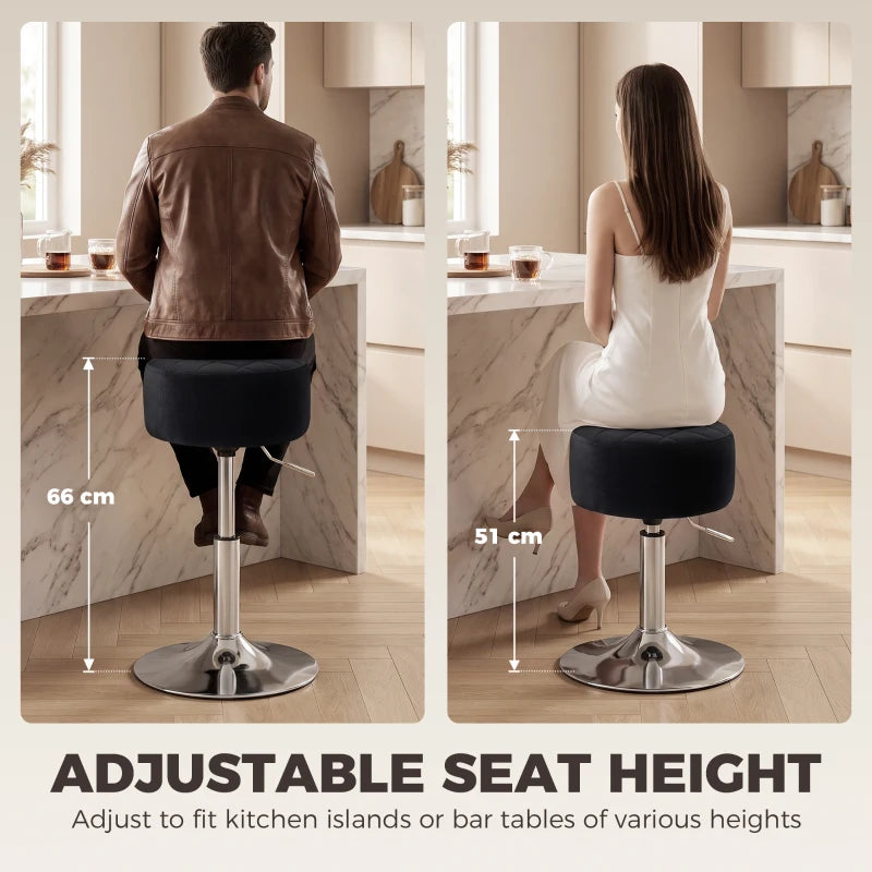 Black round swivel bar stool with padded seat and chrome round foot base
