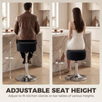 Black round swivel bar stool with padded seat and chrome round foot base