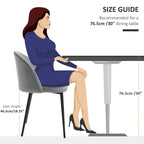 Grey upholstered dining chair with arched back, padded seat, and black metal legs