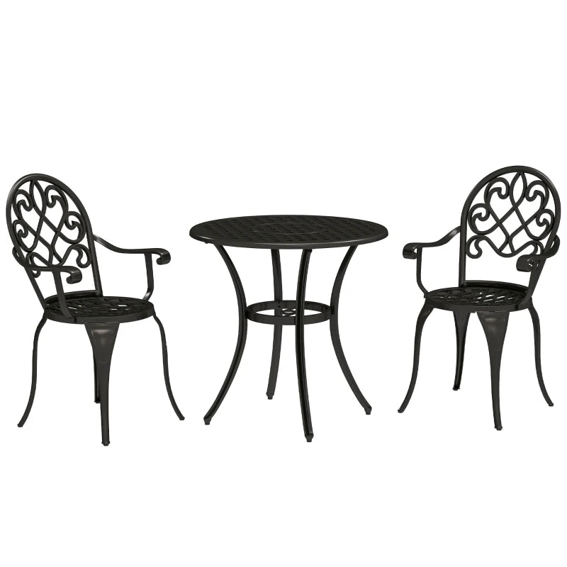 Black metal bistro table with two ornate scroll chairs, three-piece garden set