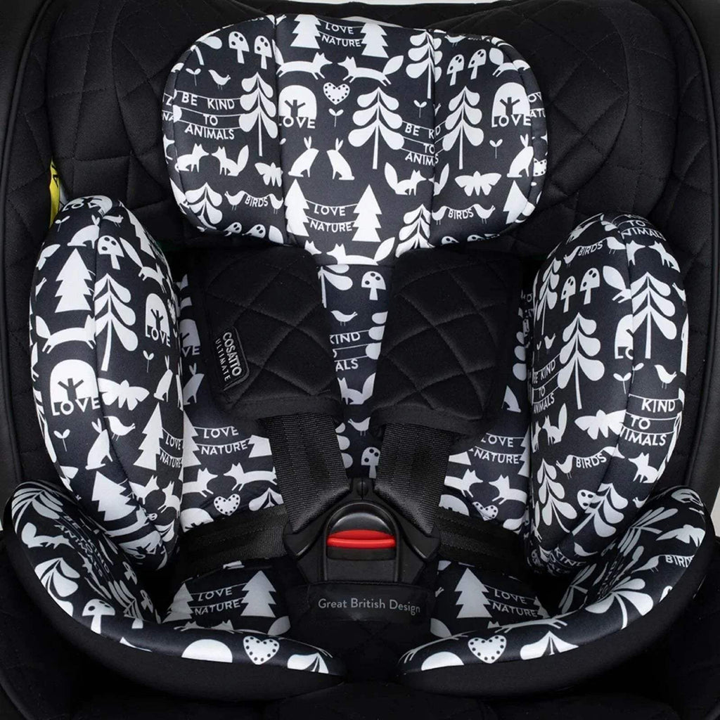 Car seat interior cushion with black-and-white animal, tree, and heart patterned fabric