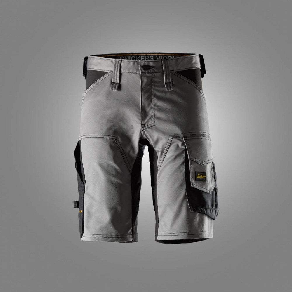 Dark grey stretch shorts with black cargo pockets and reinforced thigh panel stitching