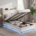 Cream single bed frame with tufted headboard and open hydraulic storage, blue LED glow