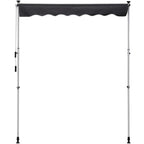Grey retractable patio awning with scalloped fabric valance and four support legs