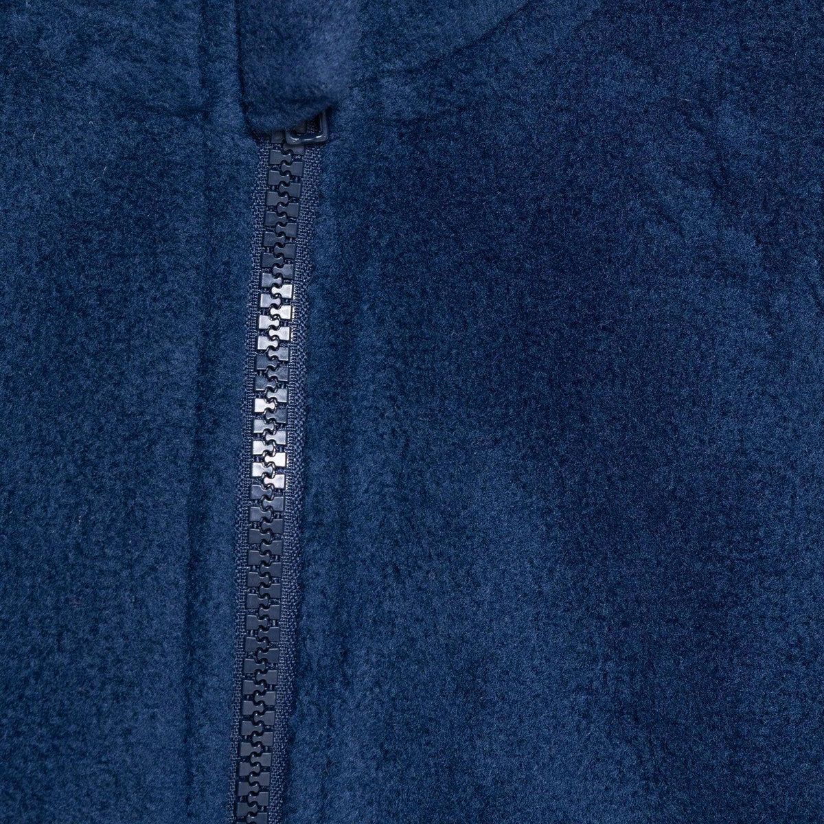 Navy blue fleece gilet close-up of front zipper