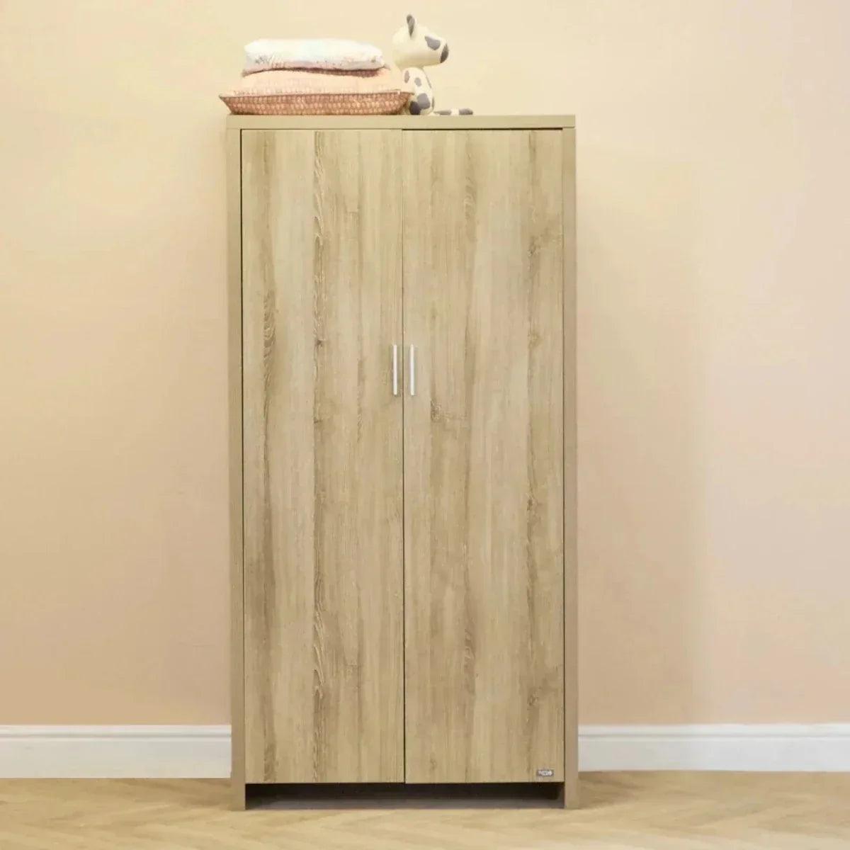 Oak wardrobe with two doors and silver bar handles, light wood finish