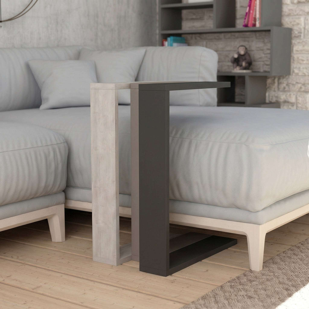 Two-tone C-shaped side table with light outer frame and dark inner shelf