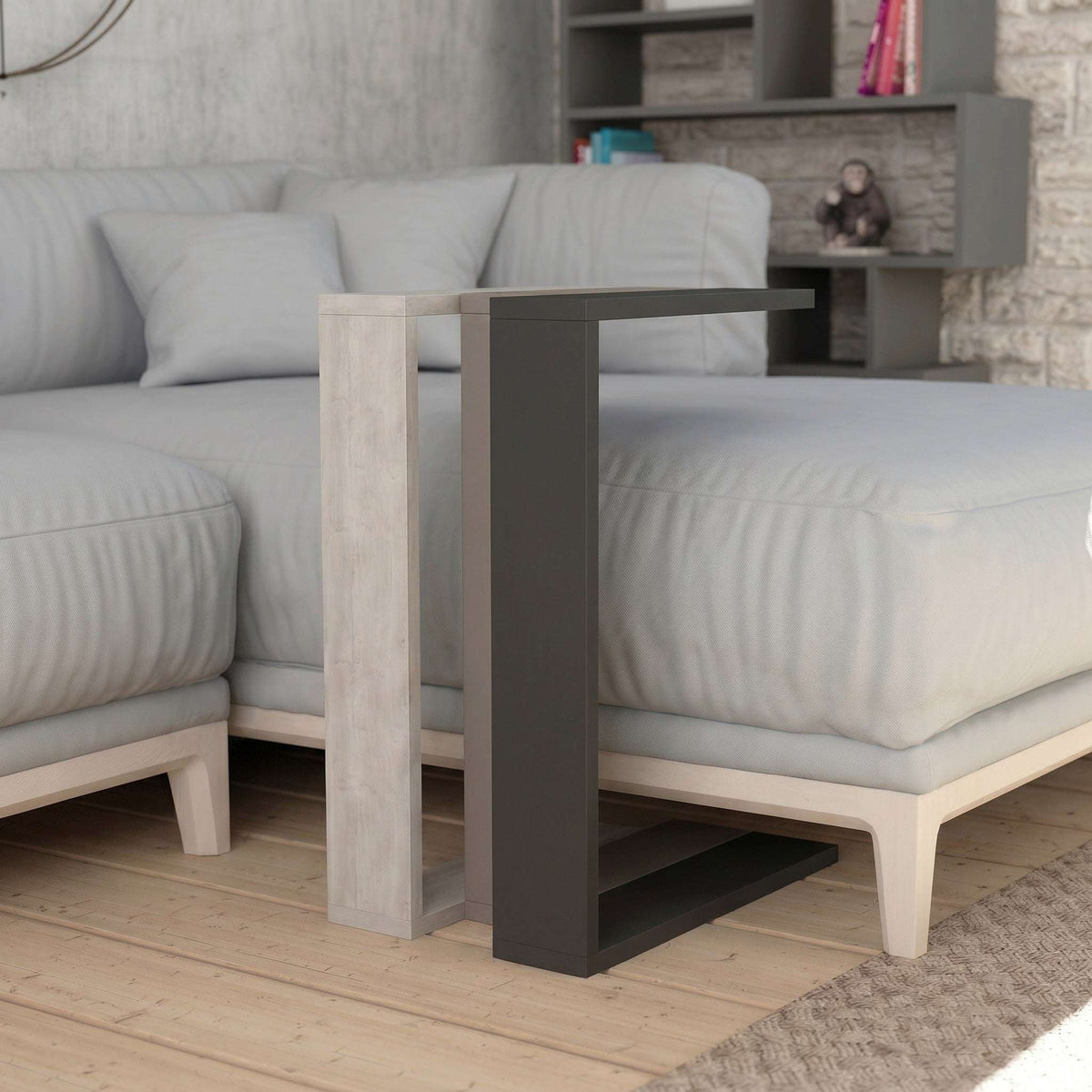 Two-tone C-shaped side table with light outer frame and dark inner shelf