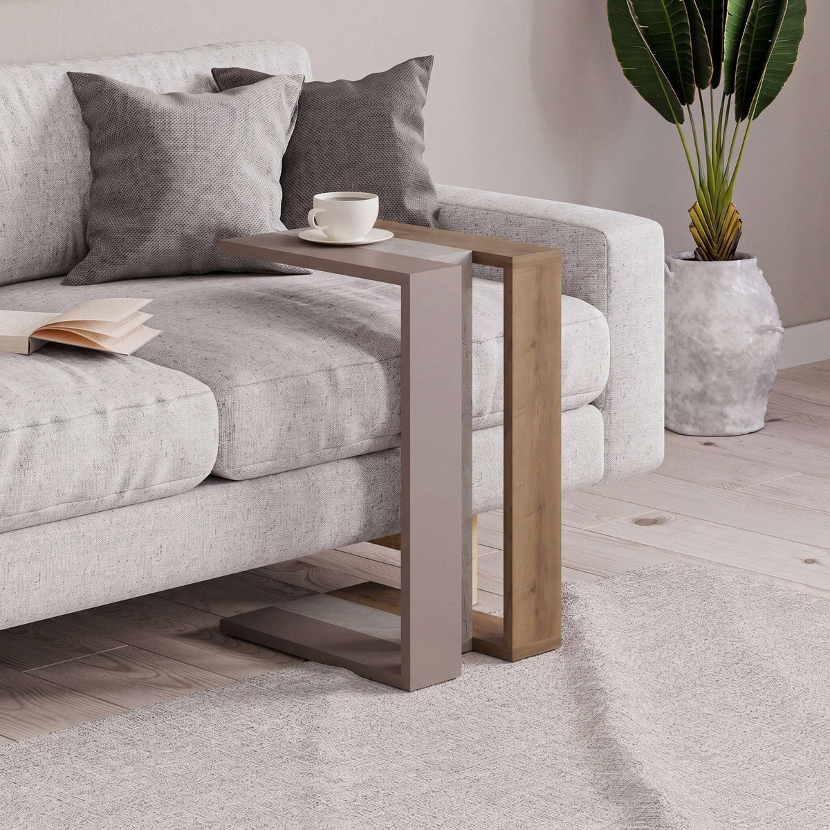 C-shaped side table in light wood with dark gray center panel and shelf