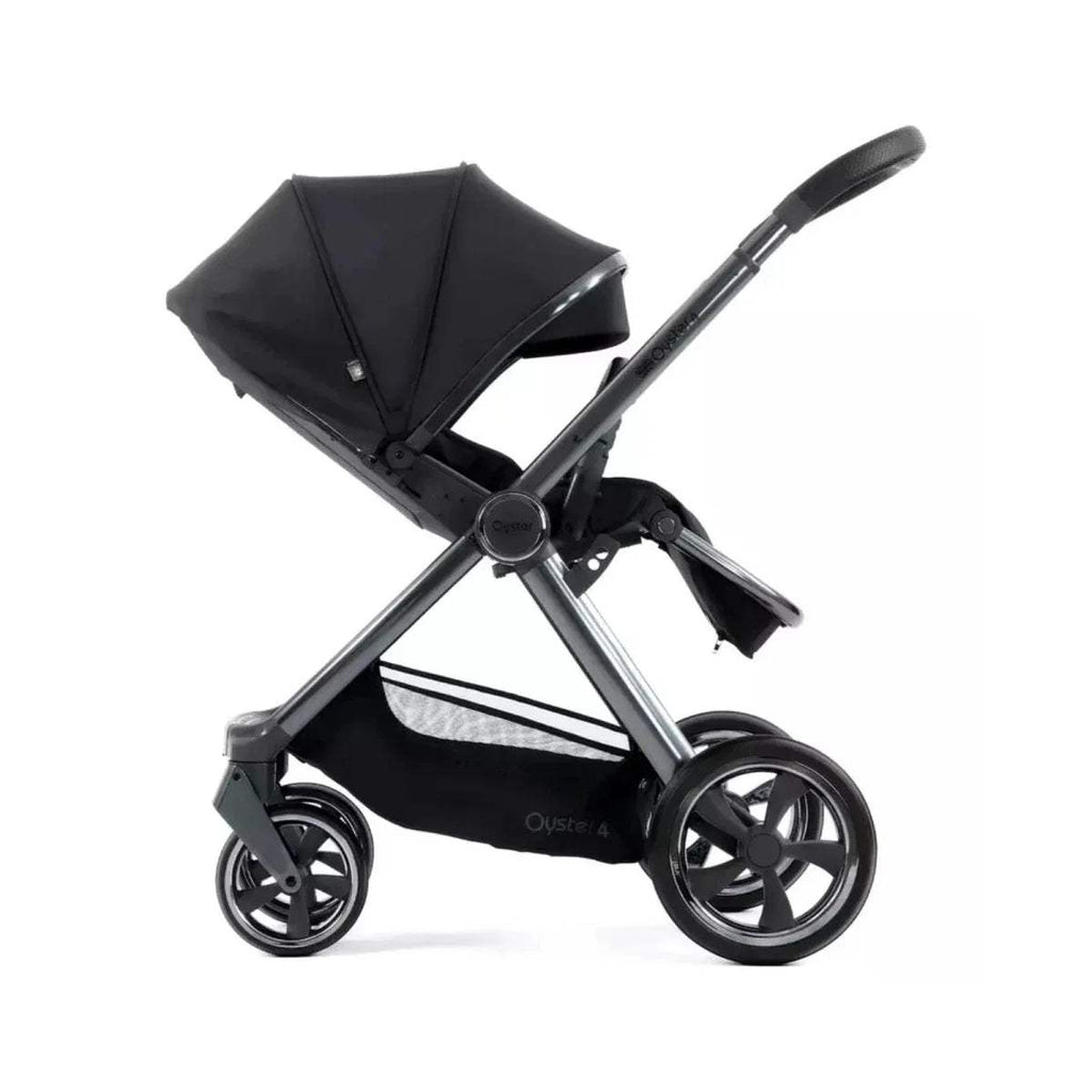 Carbonite single stroller in dark fabric with canopy and multi-position seat