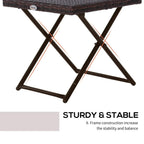 Brown folding rattan coffee table showing X-frame support under the top