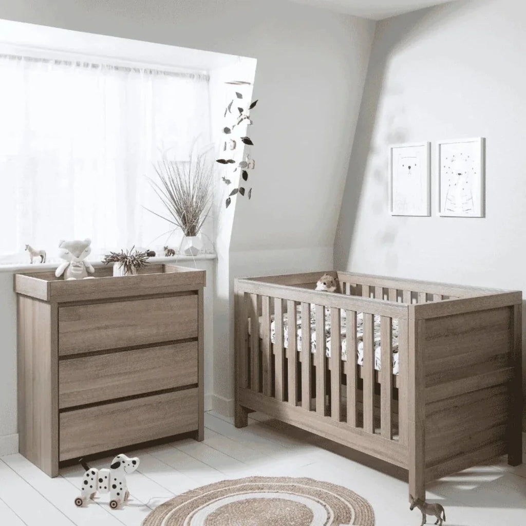 Oak baby cot and matching changing dresser with drawers