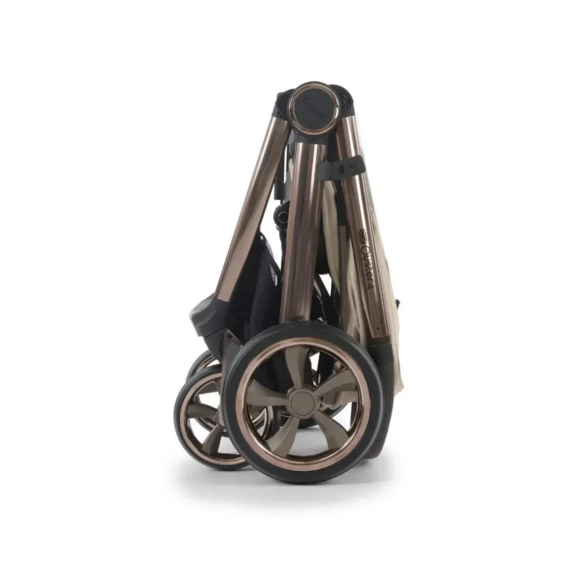 Buttermilk stroller wheels and folded frame view, showing front wheel and handle