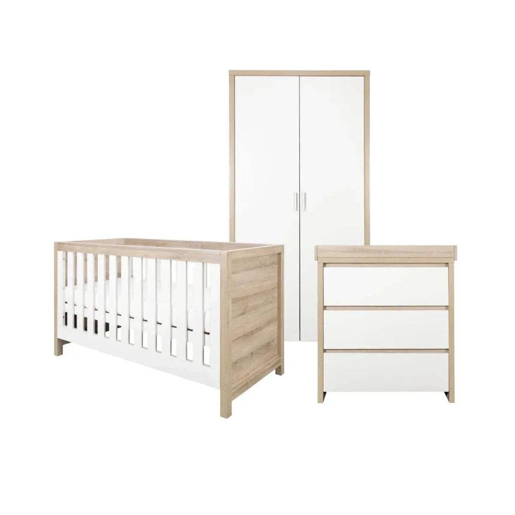 Kids cot bed with light oak frame and white slats, plus matching side cabinet.