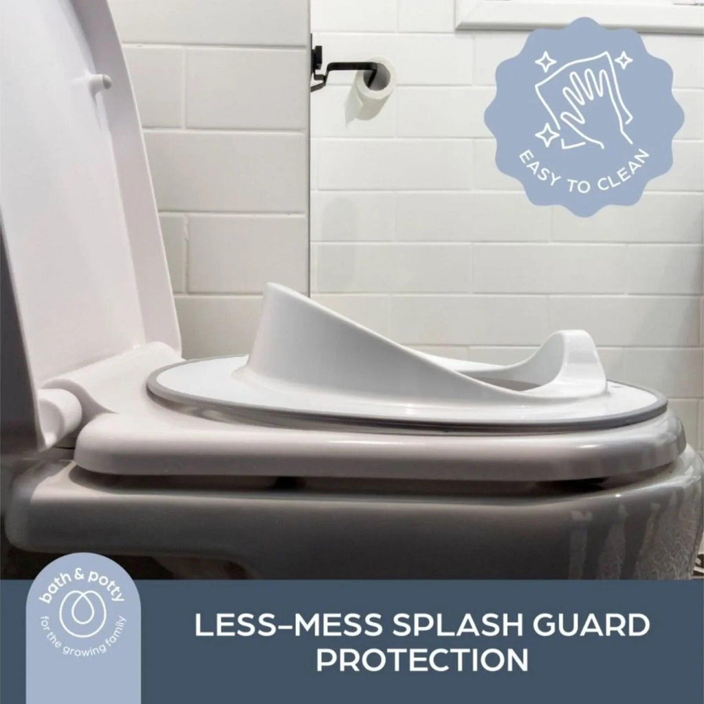 Dreambaby toilet topper with splash guard and wide base on toilet