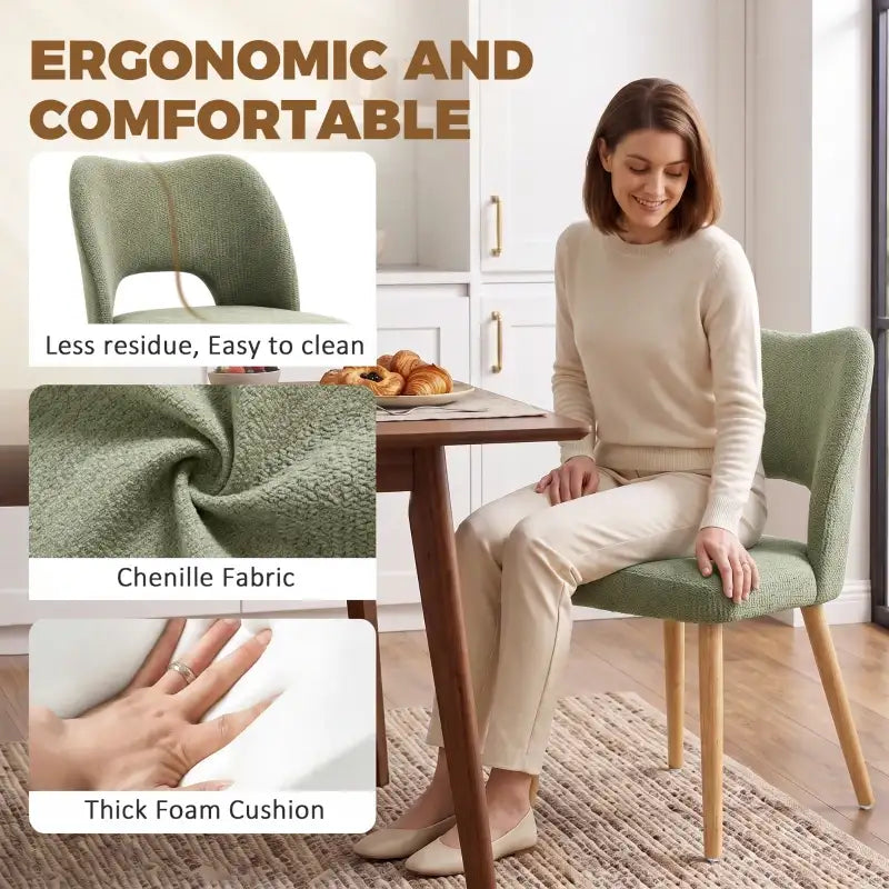 Green chenille dining chair with curved back, thick foam cushion, and light wood legs