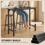 Black marble-effect bar table with open frame base and reinforced support bars