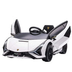 White and black kids electric ride-on car with raised scissor doors and steering wheel.