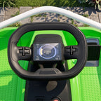Green go-kart dashboard and steering wheel with digital RPM display