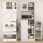 White kitchen storage cabinet with framed glass door, recessed panels, round silver handles