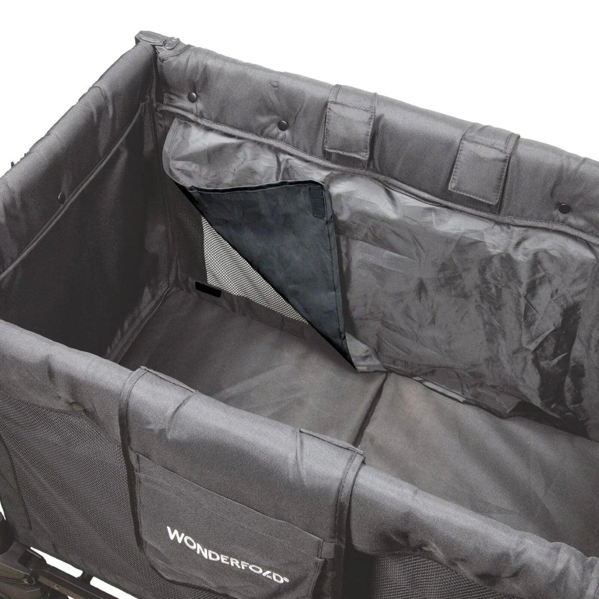 Jet black stroller wagon interior with seatback organizer pockets and padded sidewalls